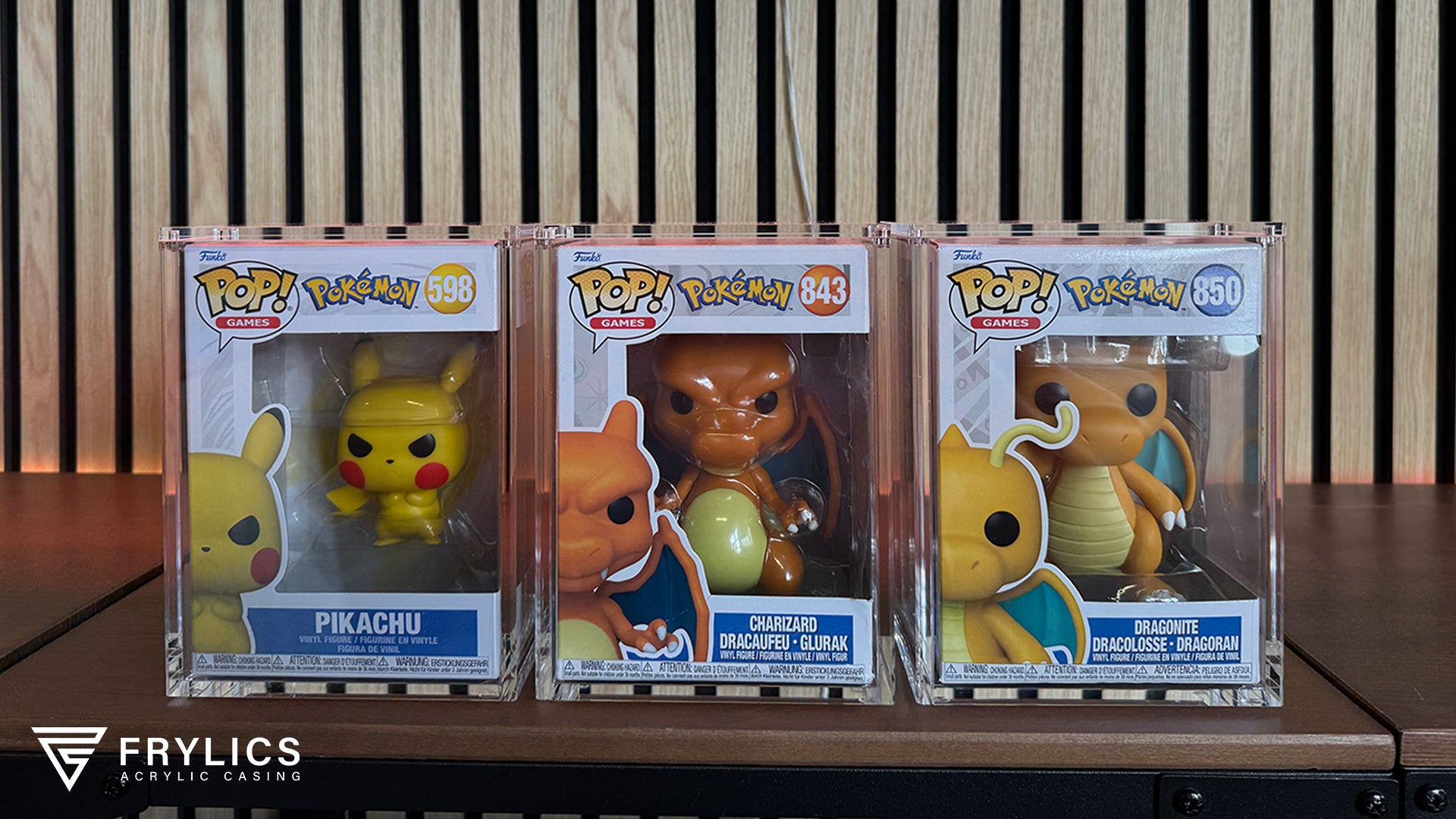 3 Frylics acryl cases met Pokemon figuren op een rij vooraanzicht